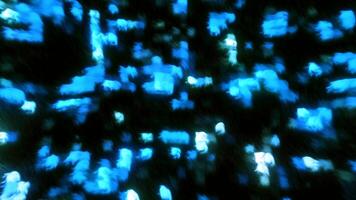 Dark background with green blue squares without focus. Motion. Light particles moving in different directions in 3d format. video