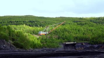 Coal Mining Operations Are Surrounded by Lush Greenery and Rich Natural Landscape. Stock Clip video