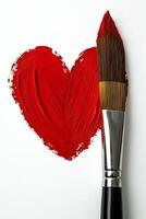 Creating a red heart shape with a paintbrush on a blank canvas for a heartfelt expression photo