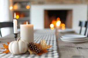 Candles and Pumpkin on Table With Fireplace photo