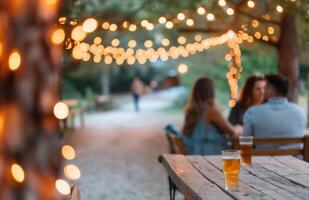 Evening Gathering at a Park With String Lights and Refreshments photo