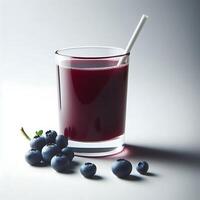 Blueberry Juice in Glass with Straw, Refreshing Summer Drink with Blueberries photo