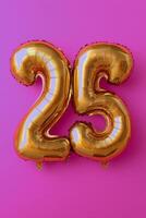 A vibrant display of golden balloons against a pink backdrop photo