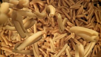 The pasta casarecce falls down. Filmed on a high-speed camera at 1000 fps. High quality FullHD footage video
