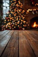 Cozy holiday atmosphere with a rustic wooden table and glowing Christmas tree in the background photo