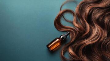 Woman with long hair holds a dropper bottle against a blue background photo