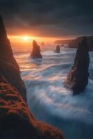 Sunset over rocky coastline with waves crashing at the beach photo