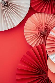 decorativo papel aficionados en rojo, negro, y blanco arreglado en un vibrante rojo antecedentes foto