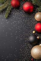 Festive Christmas decorations featuring ornaments and pine branches on a dark background photo