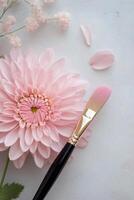Soft pink flower petals in close-up against a light background during daylight photo