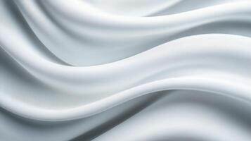 Smooth white fabric draping softly with gentle waves under natural lighting on a serene background photo