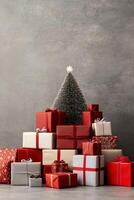 A festive arrangement of colorful wrapped gifts stacked in the shape of a Christmas tree photo