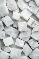 Decorative arrangement of white marble fragments showcasing natural patterns and textures photo