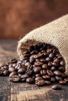Freshly roasted coffee beans spilling from a burlap sack on rustic wooden surface photo