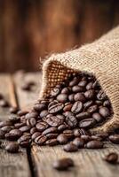 Freshly roasted coffee beans spilling from a burlap sack on rustic wooden surface photo