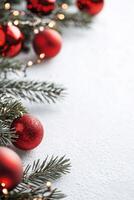 Elegant red Christmas ornaments paired with pine branches and soft sparkling background photo