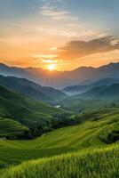 Sunset over lush terraced rice fields in mountainous landscape with vibrant sky photo