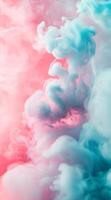 Colorful smoke in soft pink and blue swirls filling the background photo