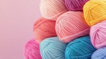 Colorful skeins of yarn stacked together in vibrant shades for crafting projects during daylight photo
