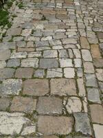 Ancient cobblestone pavement in Trogir, Croatia photo