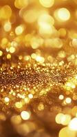 Shimmering gold texture with glowing particles creating a dazzling background effect photo