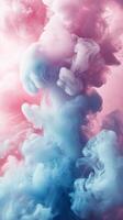 Swirling pink and blue smoke creates an abstract composition in soft pastel hues photo