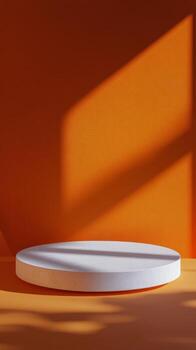 A striking orange display featuring geometric shapes and shadows during daylight hours photo