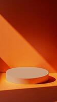 A striking orange display featuring geometric shapes and shadows during daylight hours photo