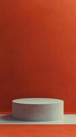 Minimalist display platform with orange geometric shapes and gradient background in modern art style photo