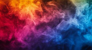 Colorful swirls of smoke blend together creating an artistic display in vibrant hues photo
