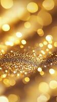Shimmering gold texture with glowing particles creating a dazzling background effect photo