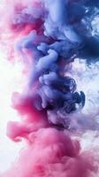 Colorful smoke swirling in dynamic patterns against a light background photo