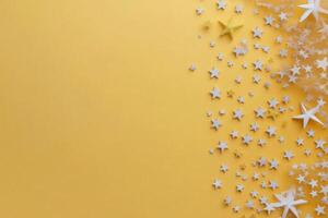 Gold and black stars scattered on a bright yellow background for festive celebrations photo