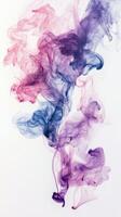 Colorful smoke swirling in dynamic patterns against a light background photo