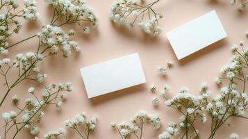 Elegant floral arrangement with empty card on soft pink background for creative messaging photo