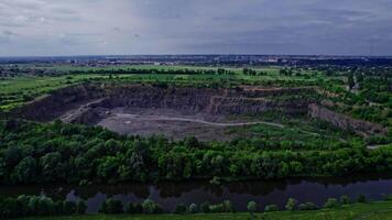 Dumpers and machines are working in the quarry mine video
