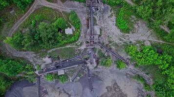 Panorama aerial view open-pit mine showing the various layers of quarrying video