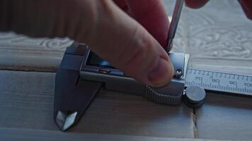 Engineer Man Measuring And Calculating With Caliper video
