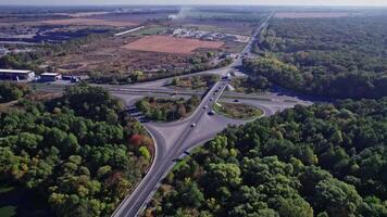 Aerial view of a highway intersection with a clover-leaf video