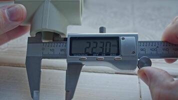 Engineer Man Measuring And Calculating With Caliper video