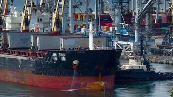 Logistics and transportation of International Container Cargo ship with tugboat in the port video