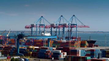 Working crane bridge in shipyard, logistic import export and transport industry background video