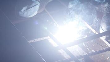 Welder uses torch to make sparks video
