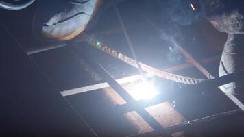 Welder uses torch to make sparks video
