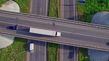 Highway and overpass with cars and trucks, interchange video