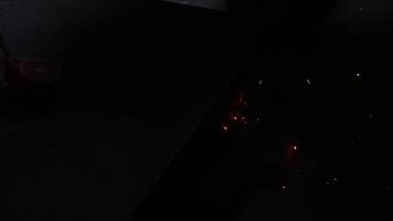 Welder uses torch to make sparks video