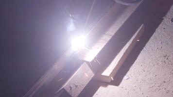 Welder uses torch to make sparks video