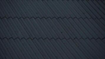 Rain flows down from a roof video