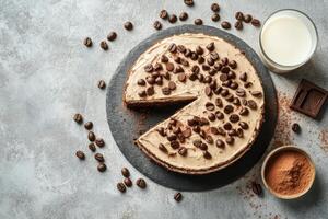 Chocolate coffee cake with toppings displayed on a dark surface alongside milk and chocolate bars photo