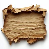 A vintage piece of torn brown paper with rugged edges and crumpled texture lying flat photo